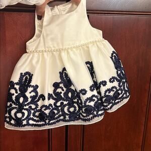 American Princess Baby Dress Cream w/ Navy Floral Embroidery. Size 6mos